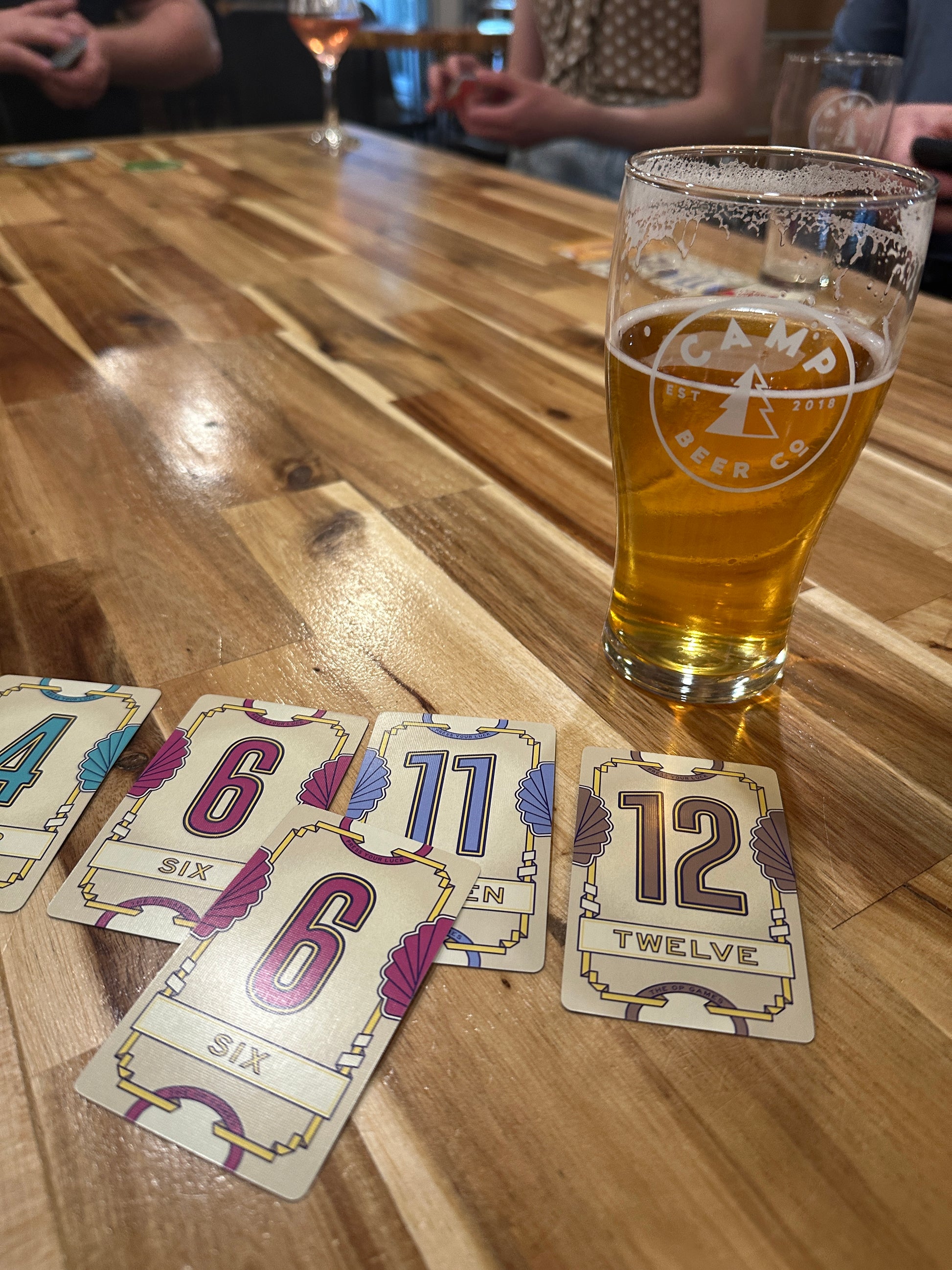 Party board game night, playing Flip 7 at Camp brewery in Langley BC